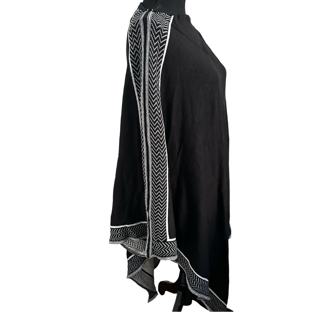 Chic Black and White Knit Poncho by Mille Collins
